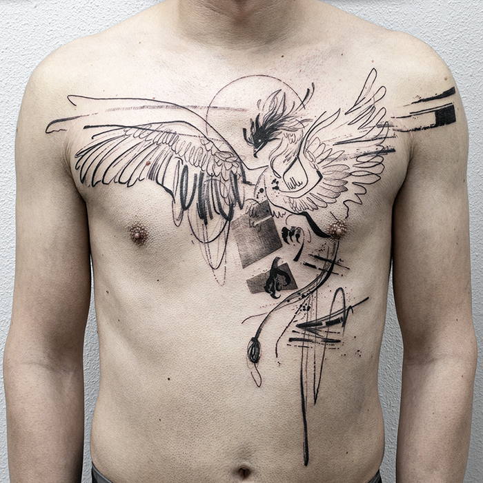 Fenix pecho abstracto Leire Mdmi Asanoha tattoo